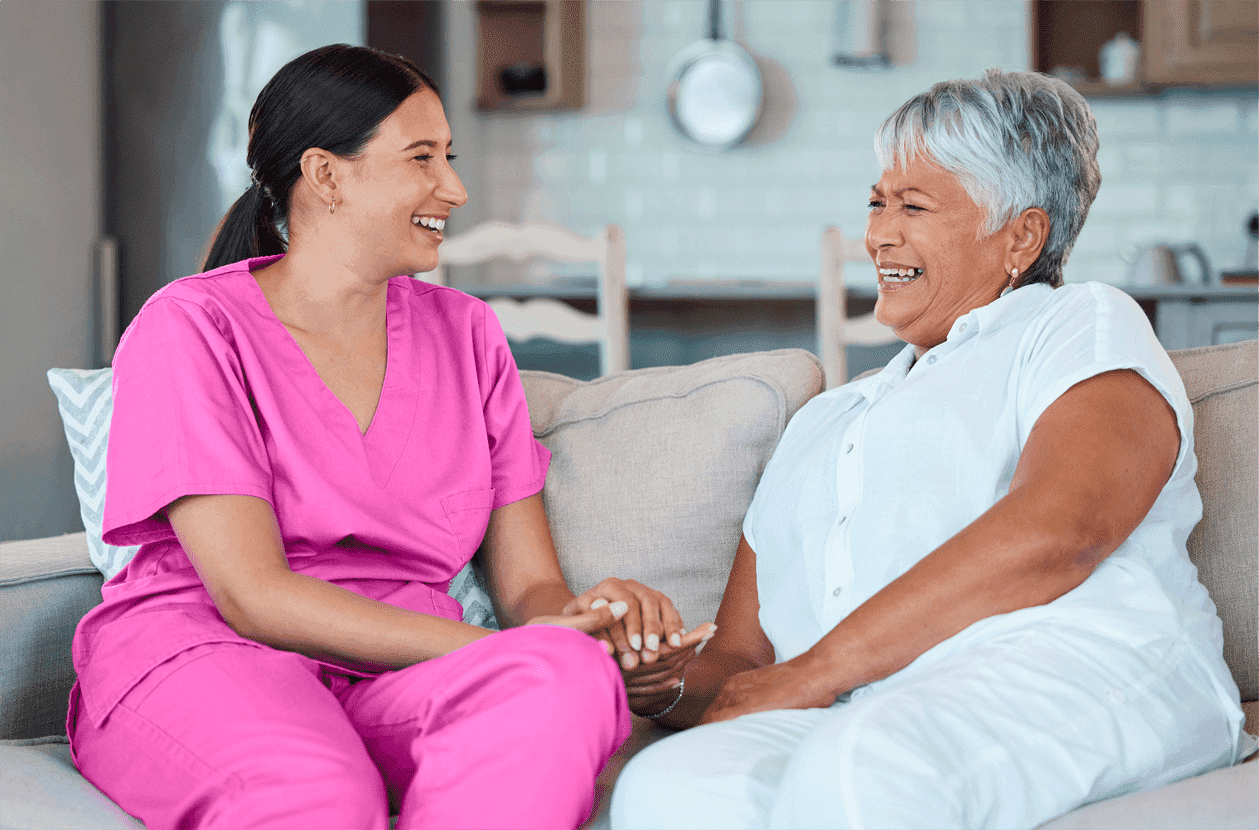 caregiver talking to senior lady