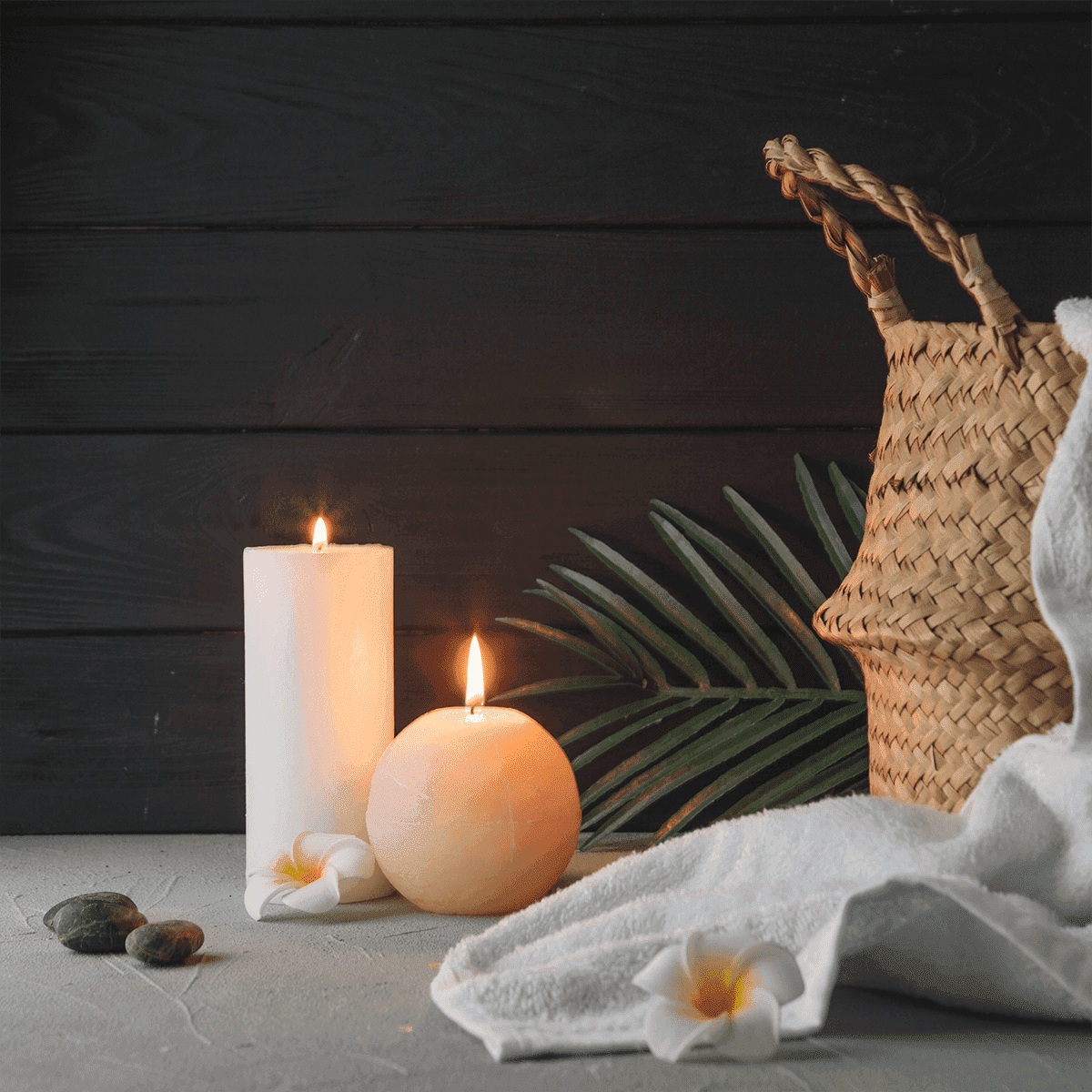 Lit candles sitting on table