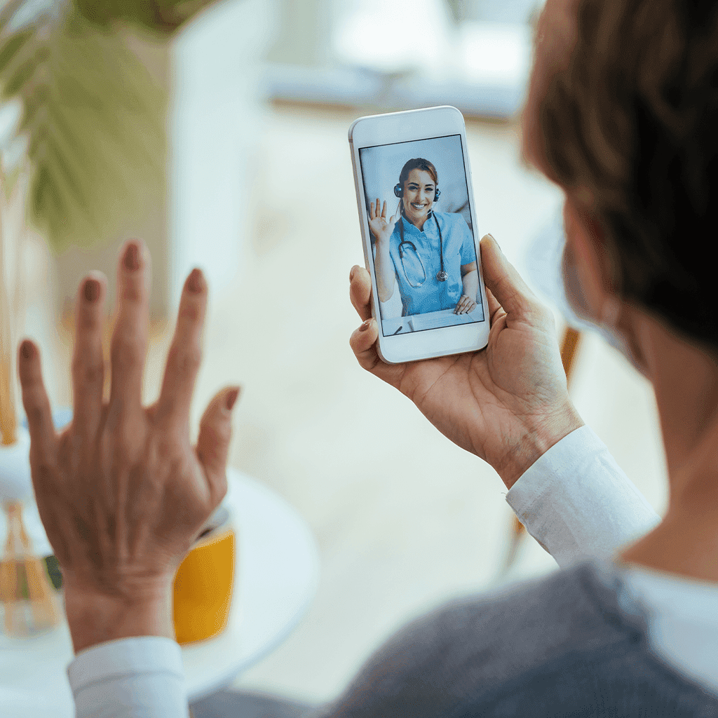 woman having a videocall with nurse