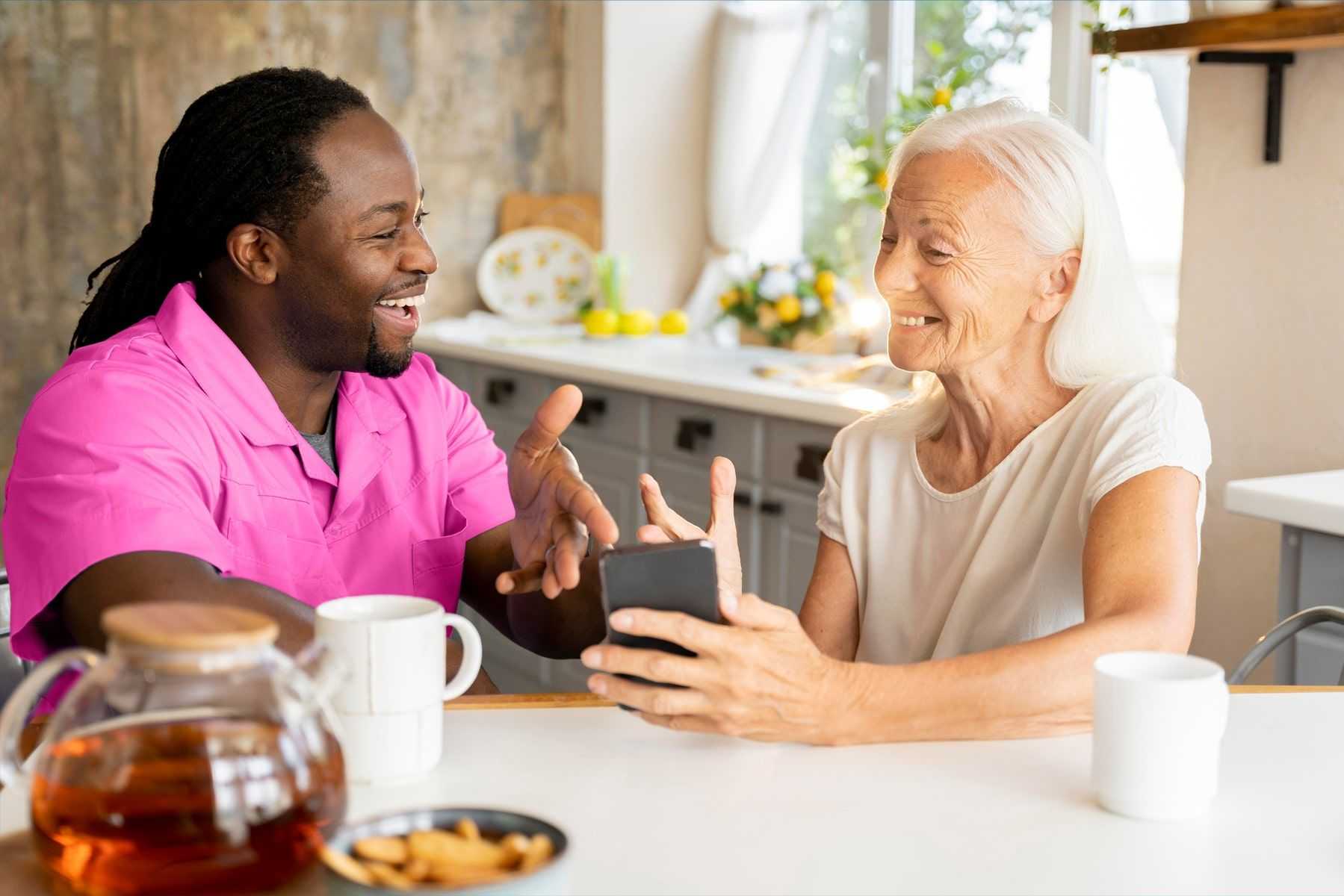 caregiver talking with senior lady