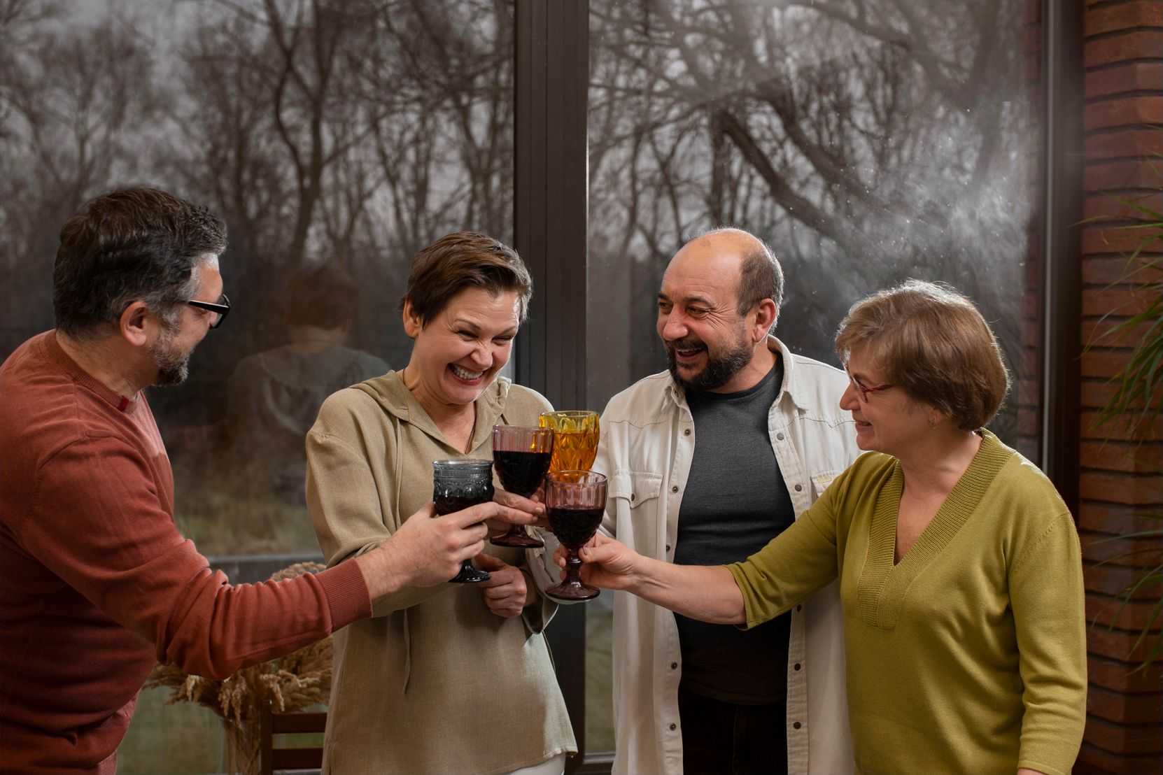 group of people clinking glasses