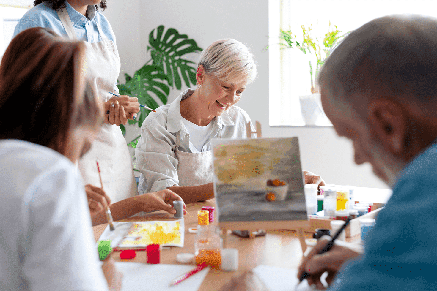 group of seniors doing art together