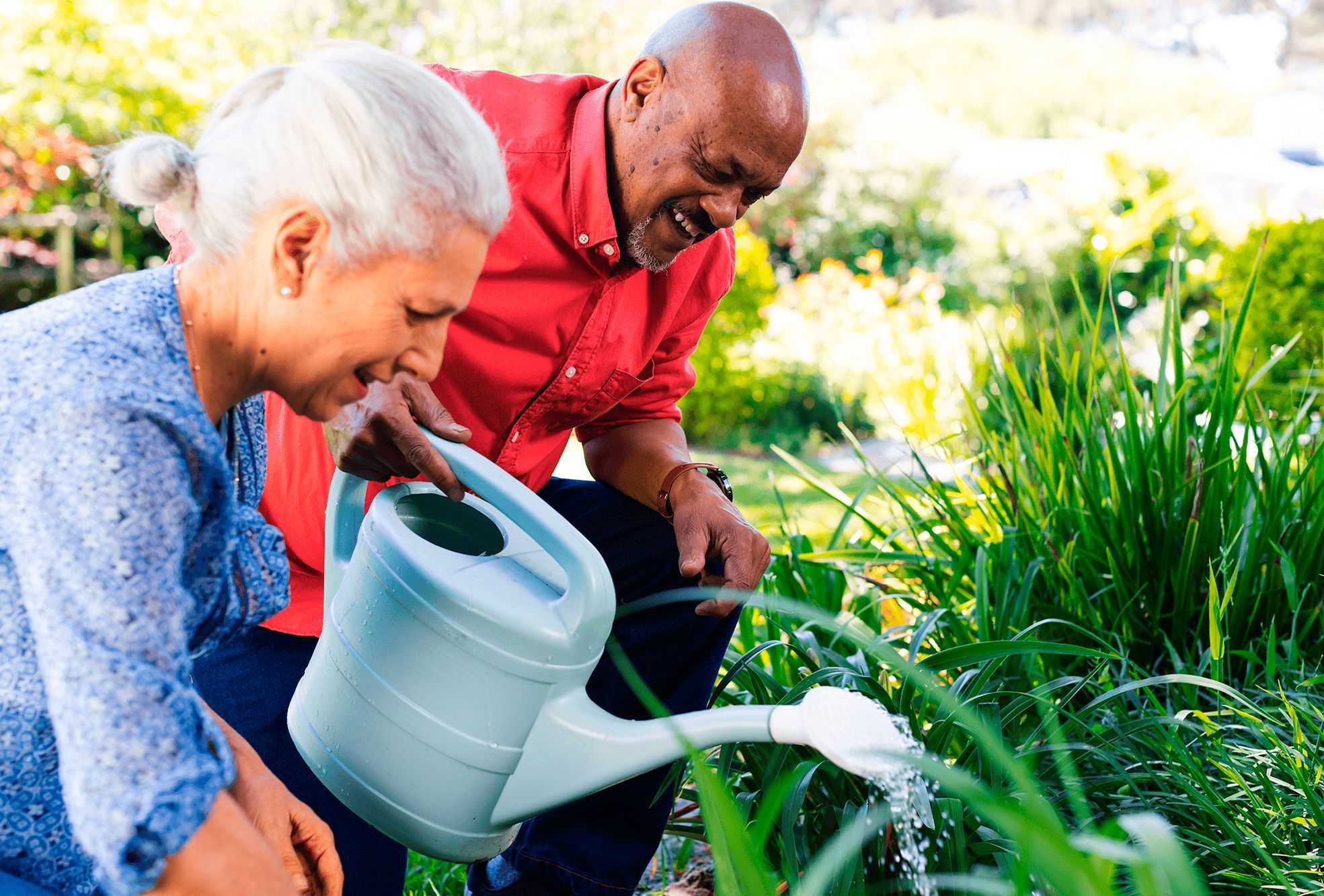 pair of elders gardening