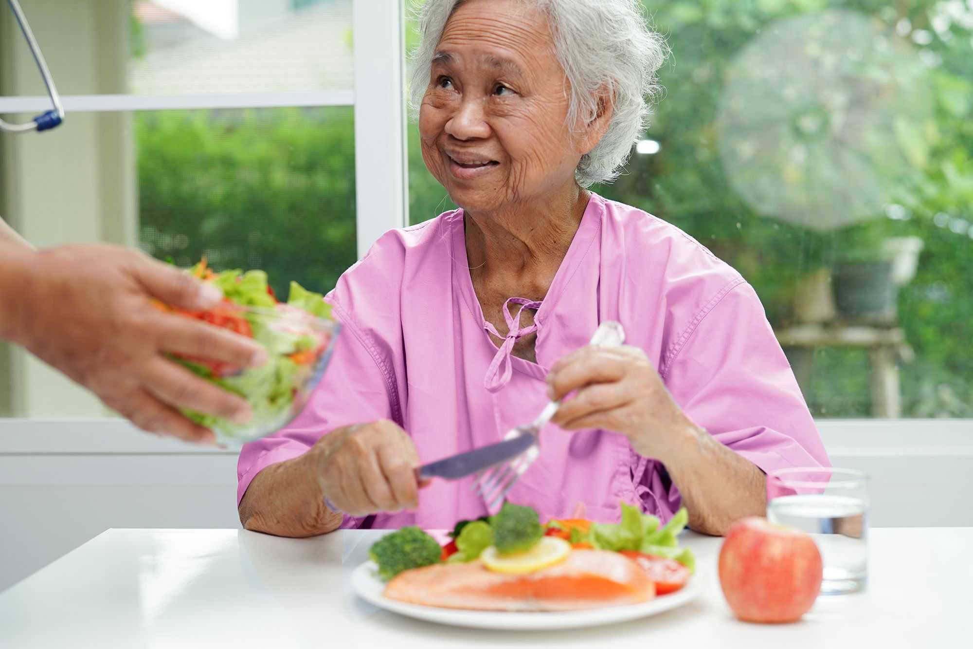 senior lady enjoying healthy lunch